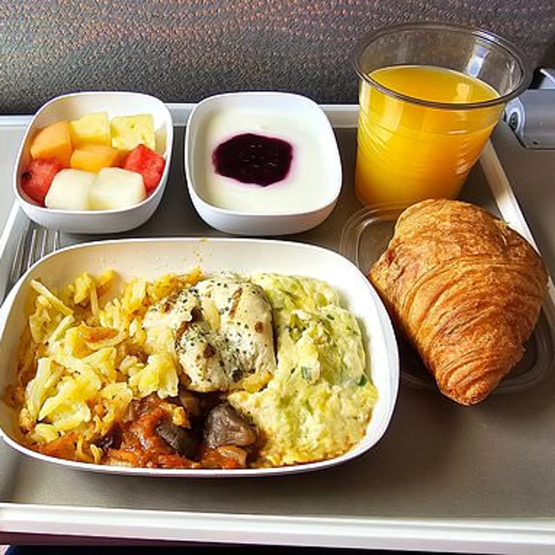 Why does airplane food taste so bland?